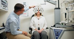 doctor-ophthalmologist-and-woman-on-phoropter-for-2024-06-11-17-20-32-utc1